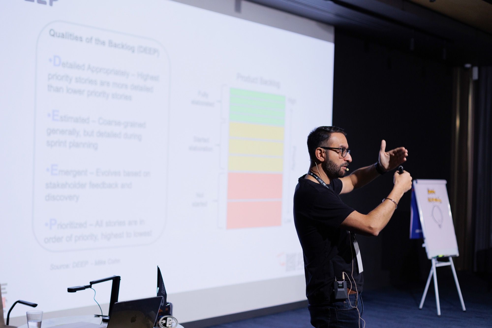 Paddy presenting a slide on the qualities of a product backlog